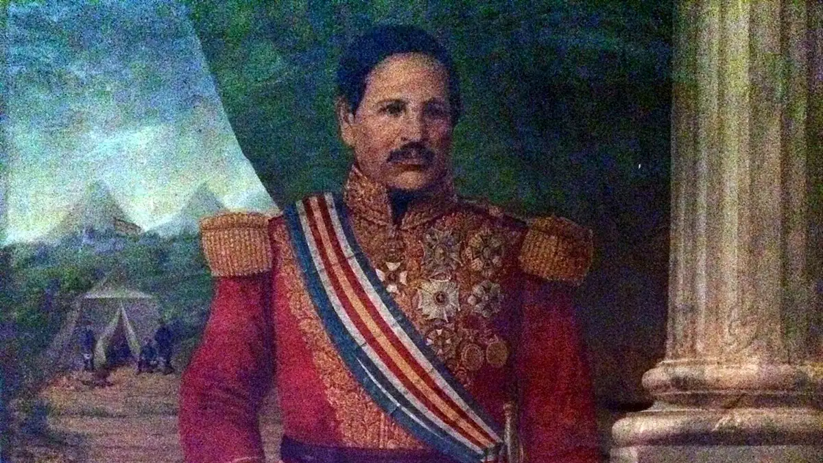 Retrato de Rafael Carrera con uniforme rojo, banda tricolor y una mano apoyada en un bastón