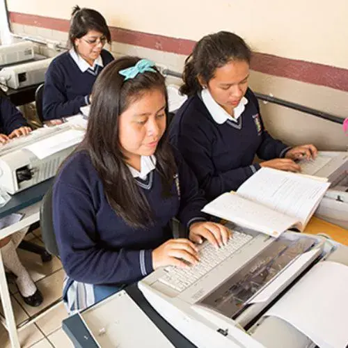 Clase de mecanografía vinculada a la formación secretarial